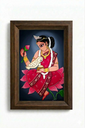 Framed Indian folk art painting of a goddess seated on a lotus