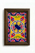 Madhubani painting of two golden fish circling in harmony