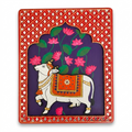 Pichwai-style relief wall art of the Kamdhenu cow